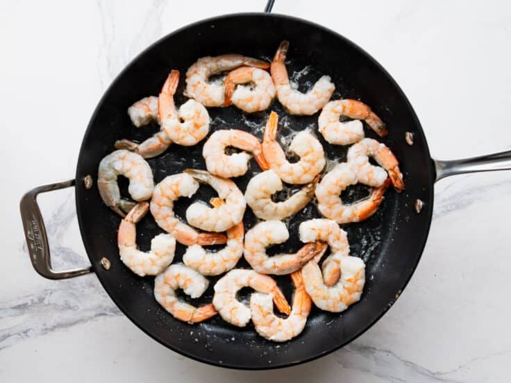 Cooked shrimp in the skillet.