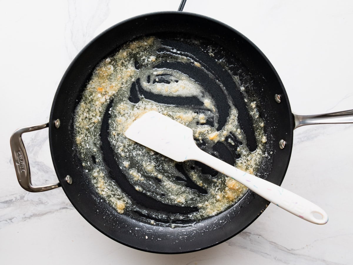 Sauteing garlic to make the sauce.