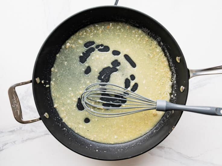 Whisking and simmering the lemon sauce.