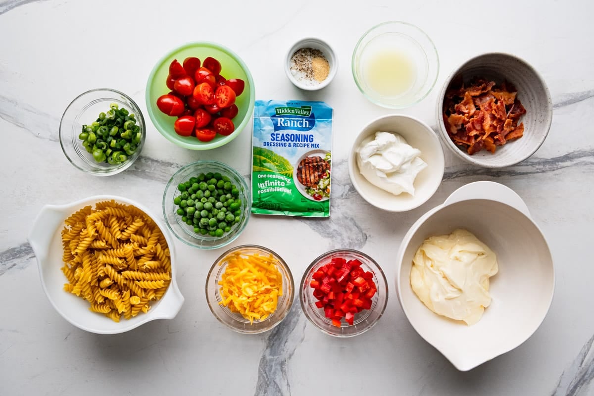 Ingredients for a bacon ranch pasta salad recipe.