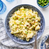Horizontal overhead shot of a bowl of southern style potato salad.