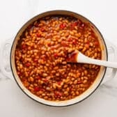 Process shot showing how to make bbq baked beans.