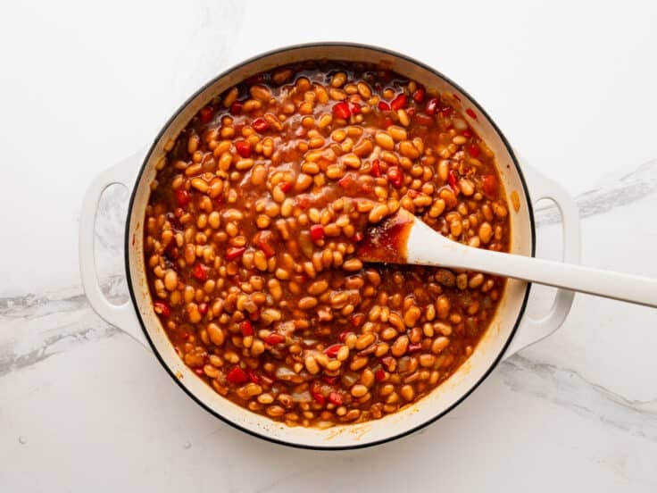 Process shot showing how to make bbq baked beans.