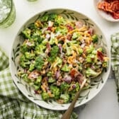 Horizontal overhead shot of a bowl of broccoli salad with bacon.