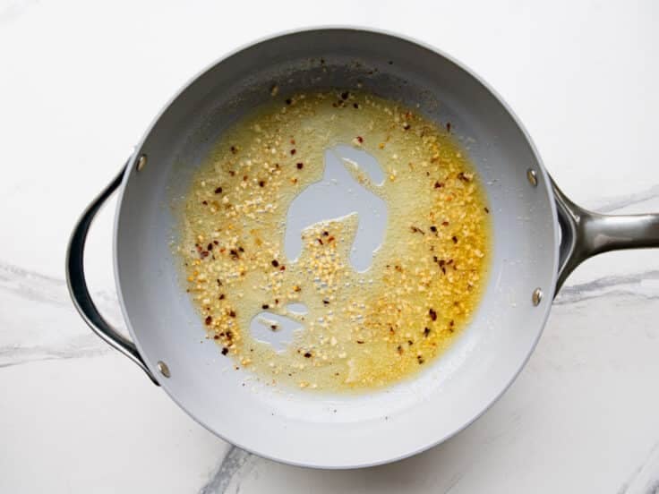 Garlic butter sauce in a skillet.