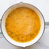 Simmering the pan sauce.