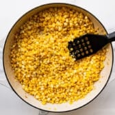 Frying corn in a skillet.