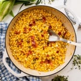 Square overhead shot of a skillet of Southern fried corn.