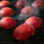 Process shot showing how to grill peaches.