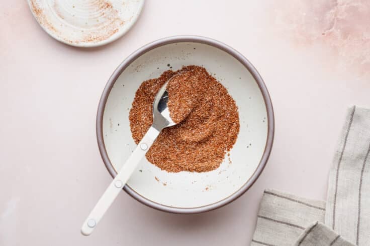 Stirring together the homemade taco seasoning blend.