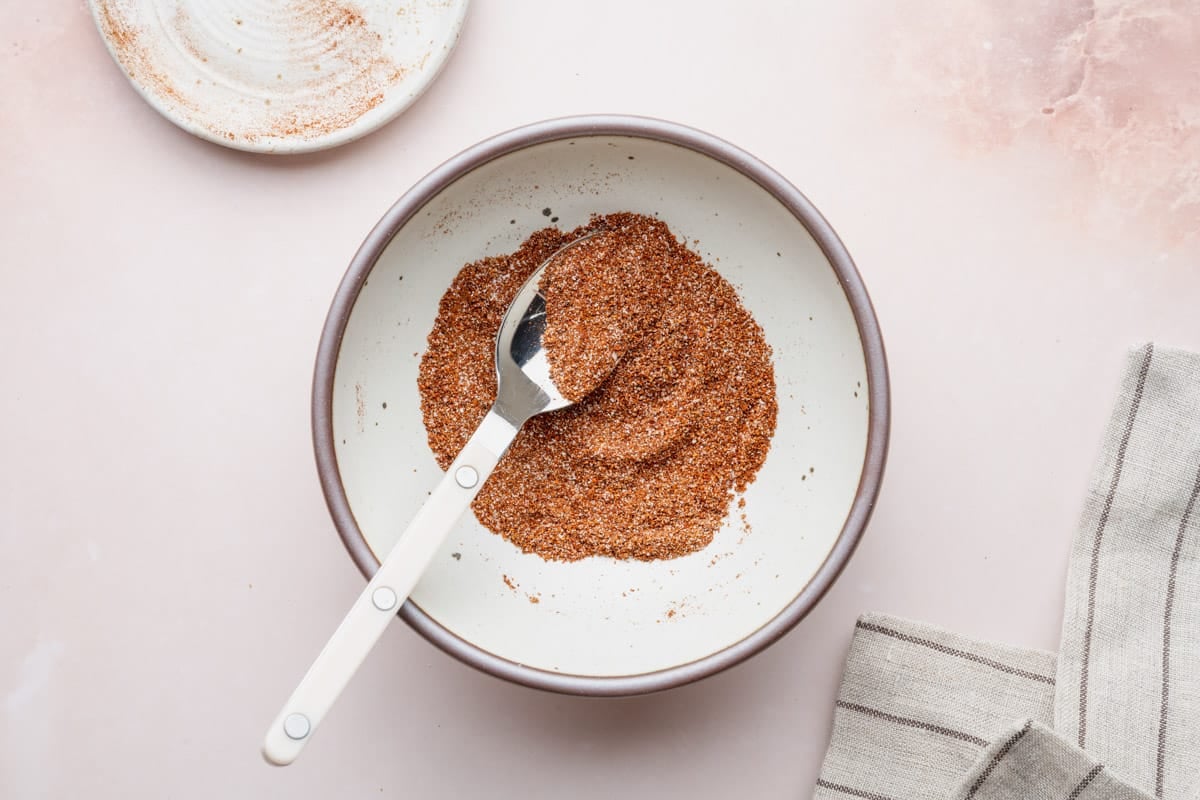 Stirring together the homemade taco seasoning blend.