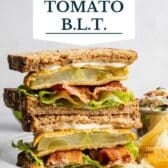Fried green tomato BLT with a text title overlay.