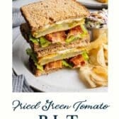Fried green tomato BLT with a text title at the bottom.