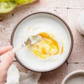 Mixing the egg and buttermilk mixture.