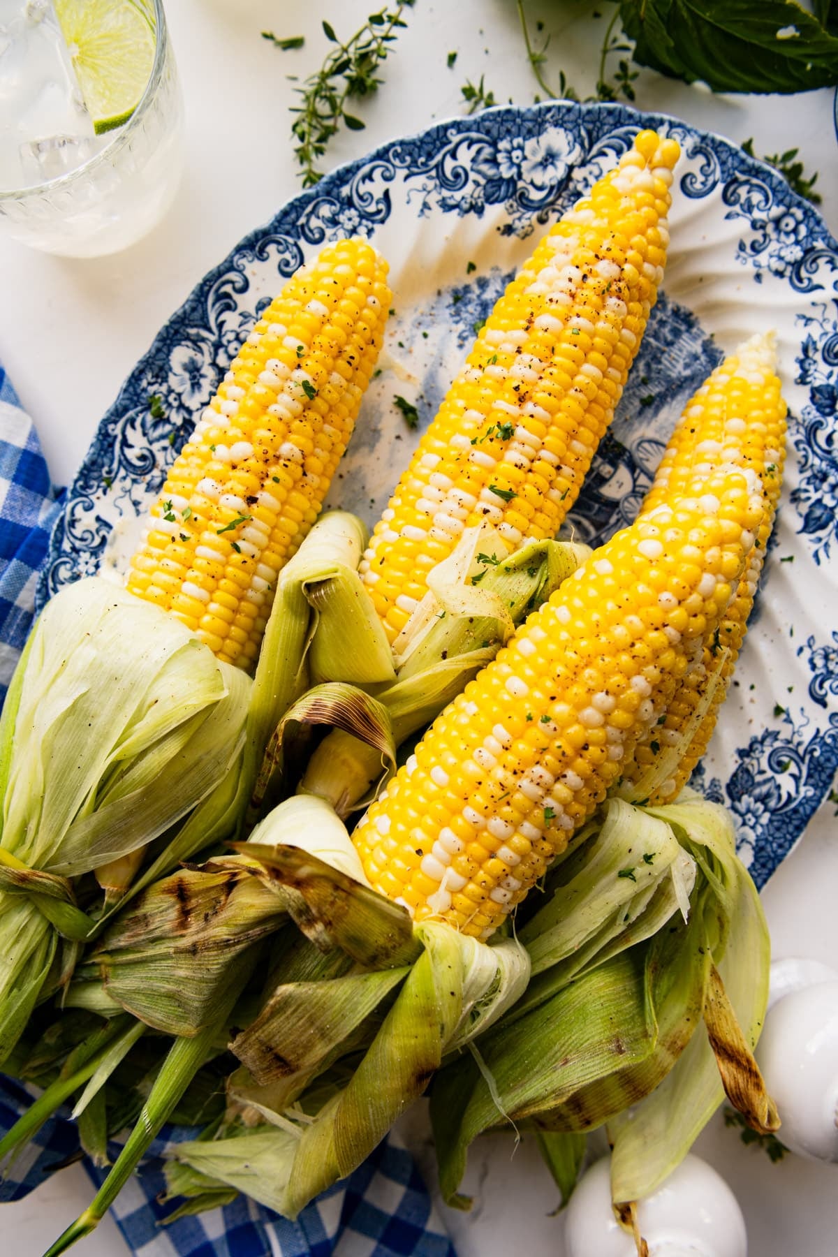 Overhead shot of a platter of grilled corn on the cob.