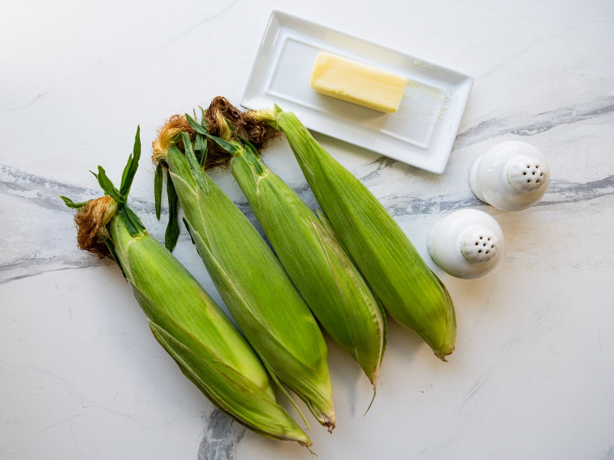 Ingredients for a grilled corn on the cob recipe.