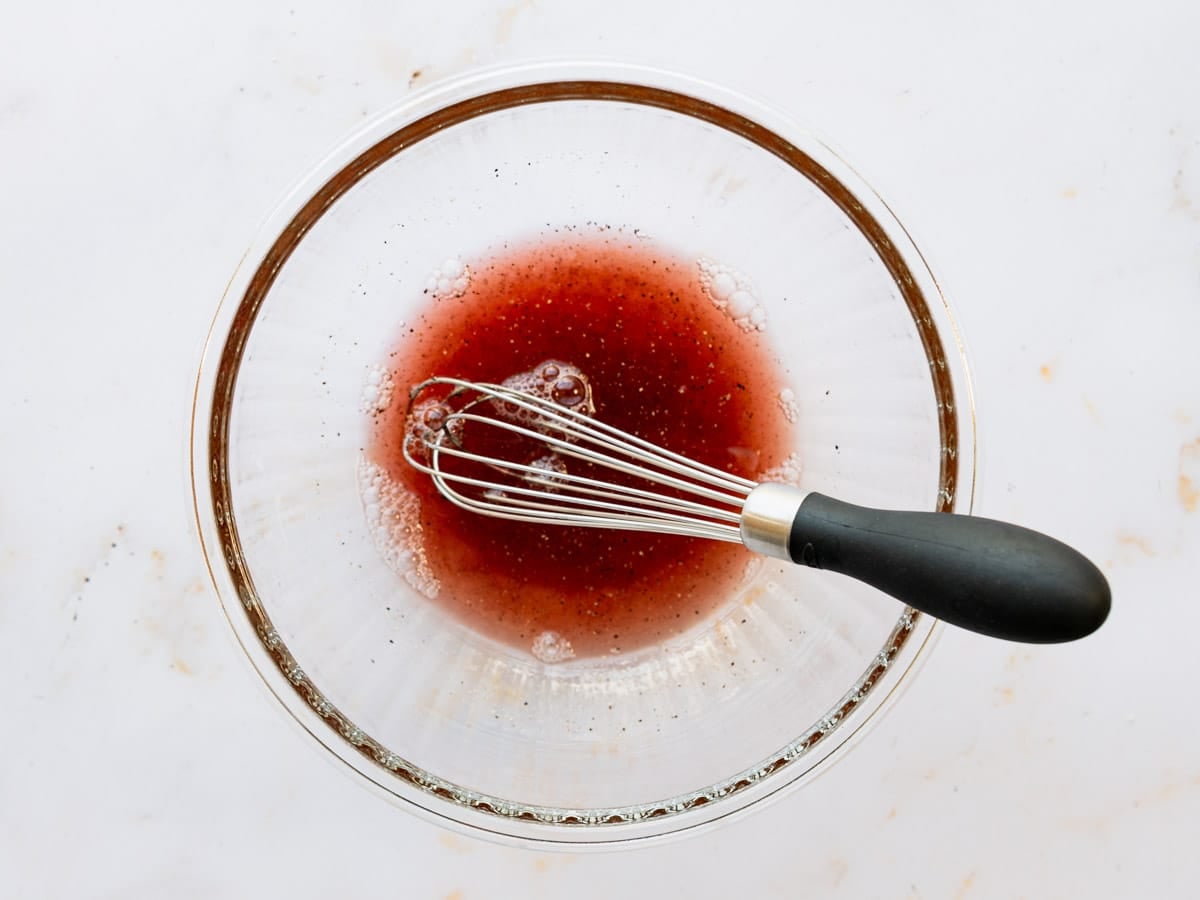 Red wine vinaigrette in a bowl for the dressing.