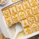 Overhead shot of a pan of chessman banana pudding with a few servings taken out.