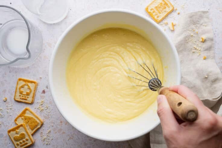 Whisking the vanilla pudding.
