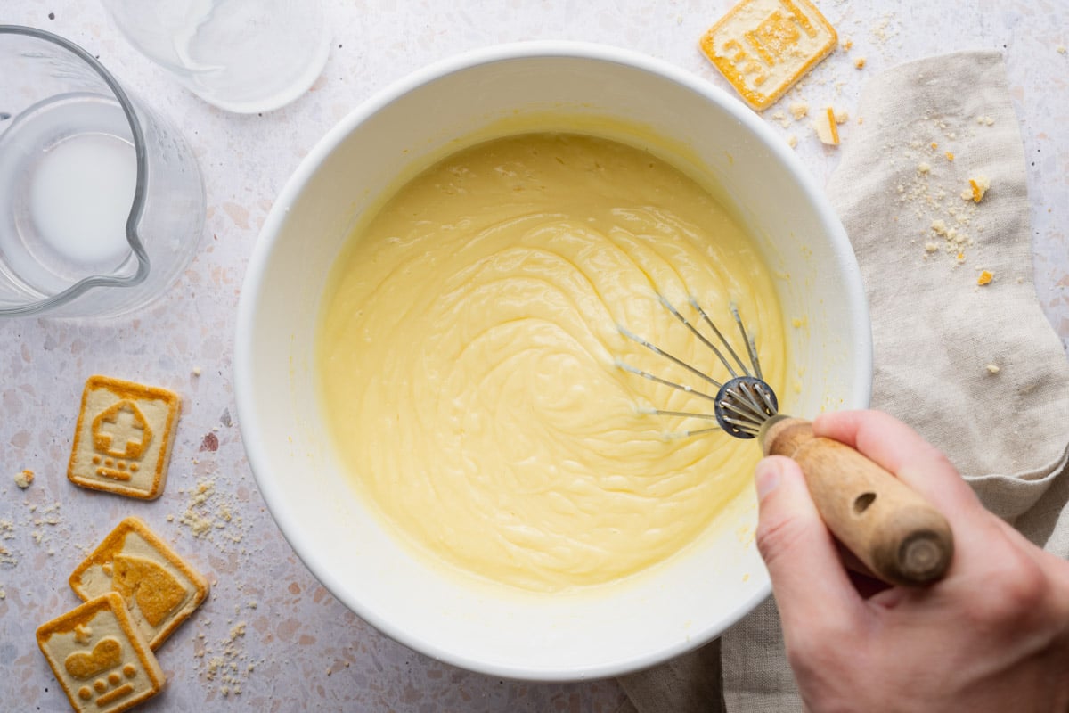 Whisking the vanilla pudding.