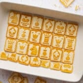 A layer of chessman cookies in the dish.
