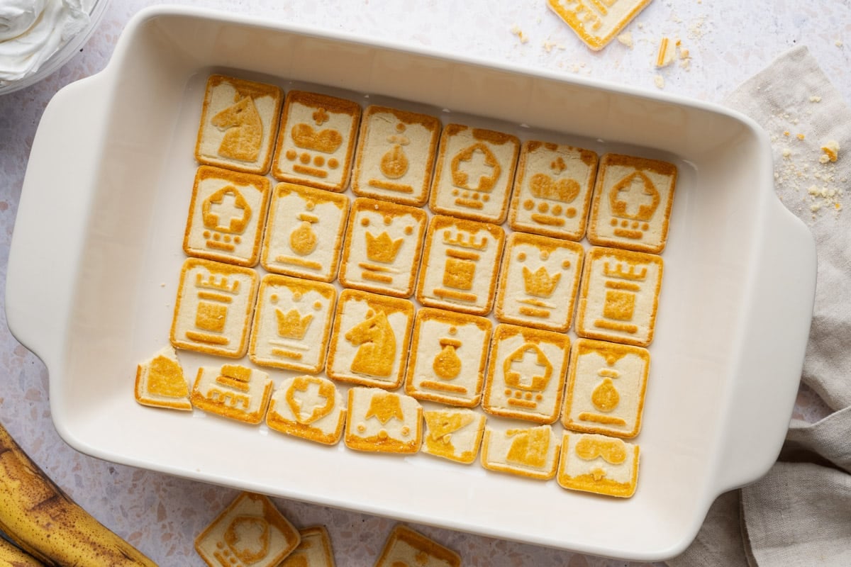 A layer of chessman cookies in the dish.