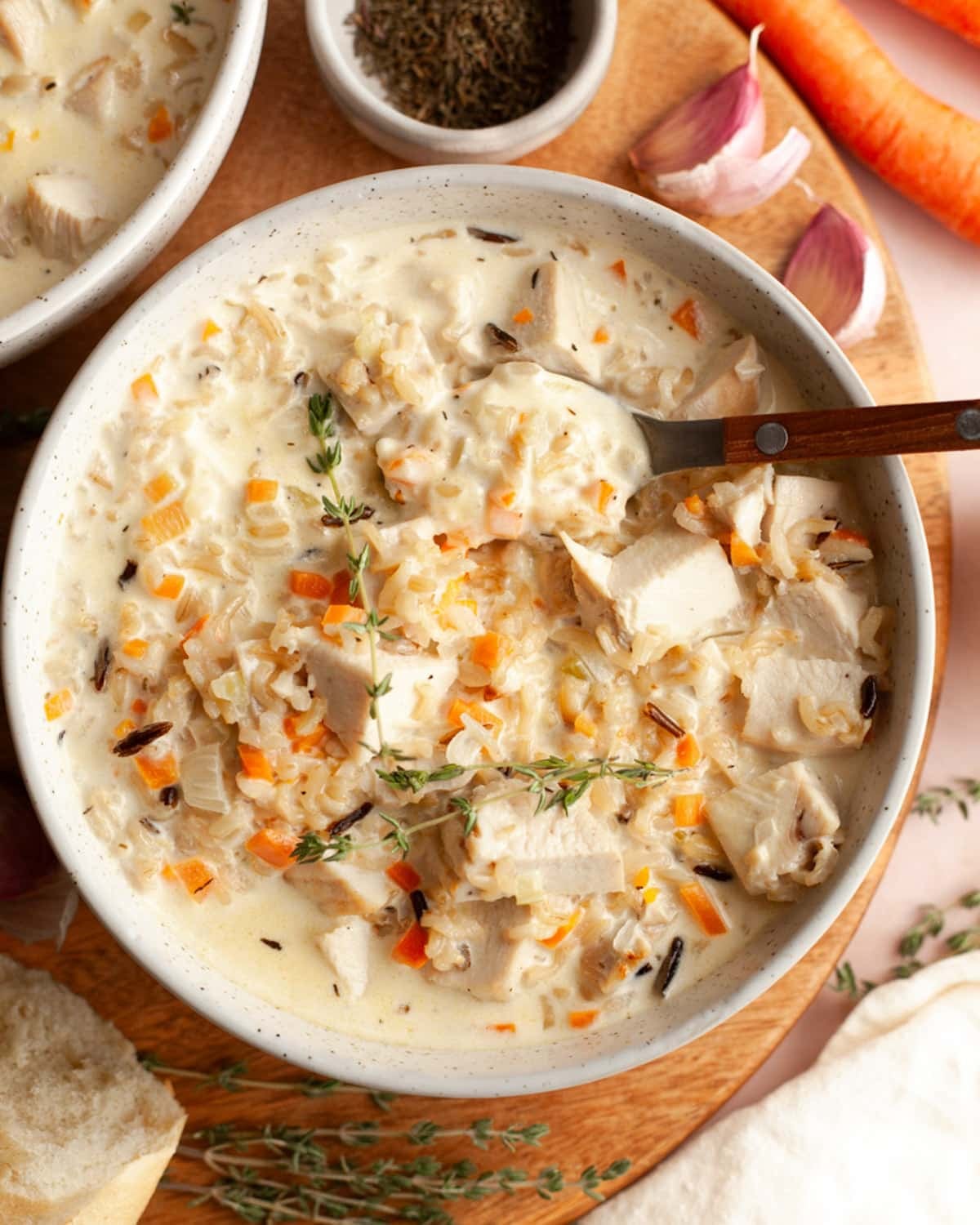 Overhead shot of a bowl of creamy chicken and wild rice soup.