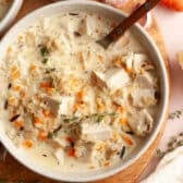 Horizontal overhead shot of a bowl of creamy chicken and wild rice soup.