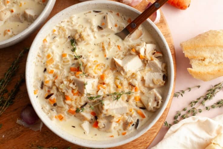 Horizontal overhead shot of a bowl of creamy chicken and wild rice soup.