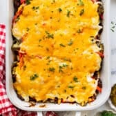Square overhead image of a John Wayne casserole baked in a white dish.