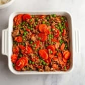 Arranging the filling in a baking dish.